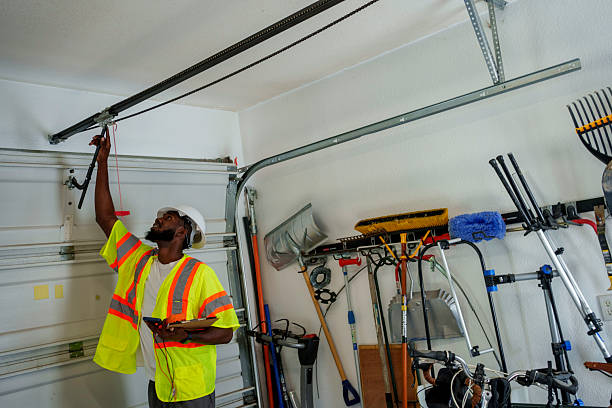 Professional Garage Door Installation technician working in Whitinsville, MA